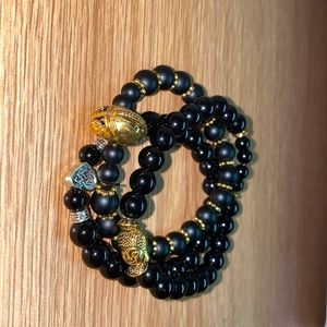 3 hand beaded bracelets. Made by me.